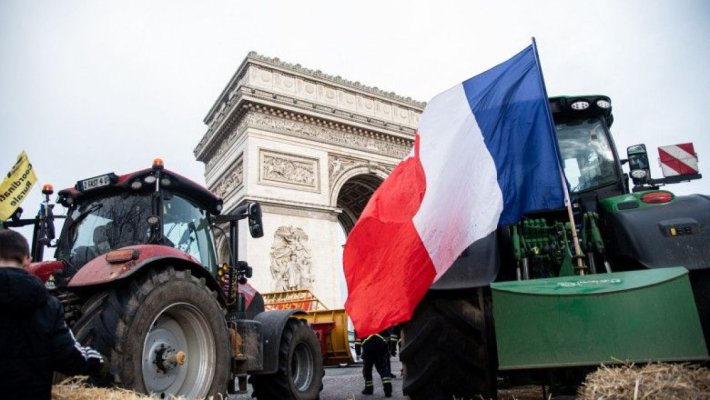 Zeci de arestări la Paris după ce fermierii au invadat zona Arcului de Triumf cu tractoare