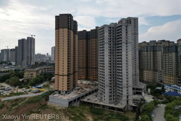Declinul de pe piaţa imobiliară chineză a continuat în luna mai