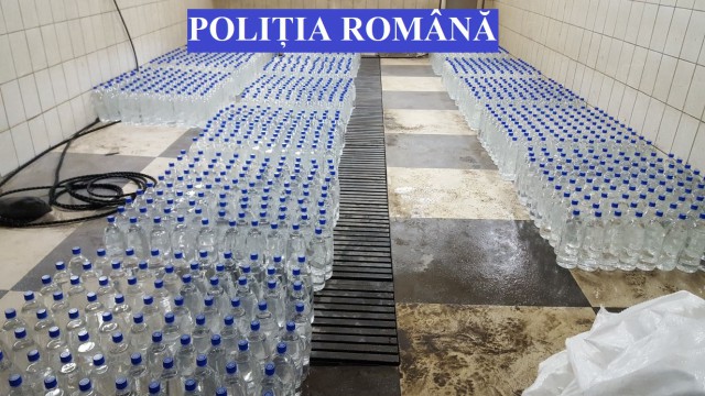 Mii de litri de alcool, confiscate de polițiști